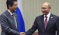 Abe önce Trump'la sonra Putin'le görüştü