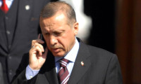 Erdoğan'dan gazeteciye telefonda başsağlığı