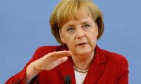 Merkel'den ABD'nin ek vergi kararına tepki