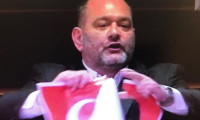 AP'de küstah Yunan milletvekilli Türk bayrağını yırttı