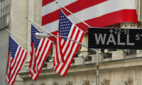 Wall Street'te haftanın son günü 3 rekorla kapanış