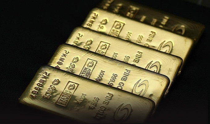 Altın, dolar ve hisselerdeki yükseliş ile geriliyor