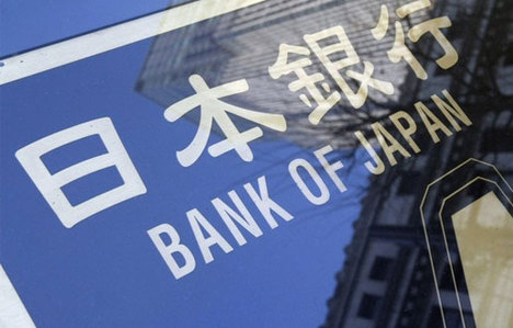 BOJ parasal genişlemeyi artırdı